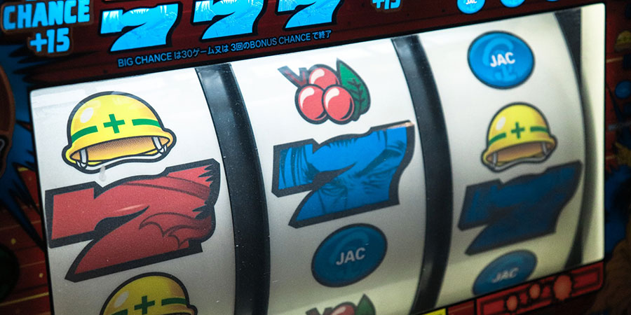 a slot machine displays 7 three times